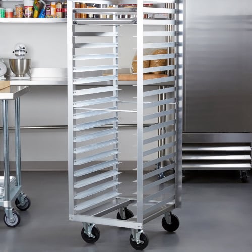 Empty mobile sheet pan rack in a commercial kitchen