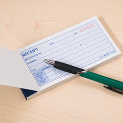 Receipt booklet with a pen