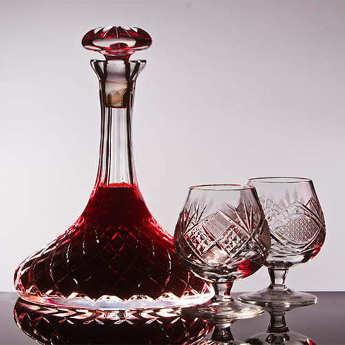 A Crystal Wine decanter with two crystal sniffer glasses