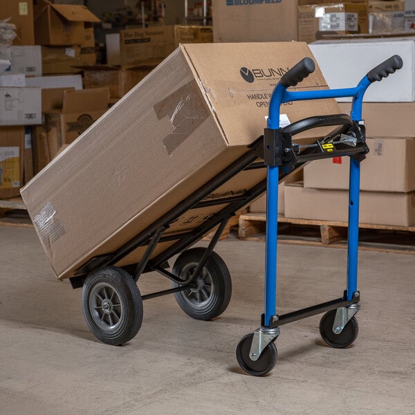 Convertible hand truck holding a large package