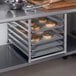 Regency Table-Mounted Aluminum Bun Pan Rack for 30" and 36" Wide Work Tables - 6 Pan Capacity Main Thumbnail 1
