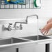 Waterloo FW815DJ Wall-Mounted Faucet with 8" Centers and 15" Double-Jointed Swing Spout Main Thumbnail 1