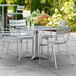 Lancaster Table & Seating 32" x 32" Silver Powder-Coated Aluminum Dining Height Outdoor Table with Umbrella Hole and 4 Arm Chairs Main Thumbnail 1