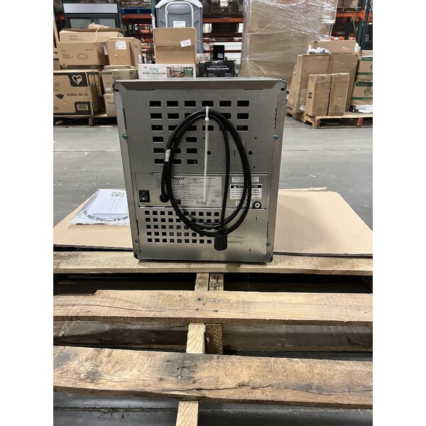 Scratch and Dent Follett 7CI112A-IW-CL-ST-00 Champion 7 Series Air Cooled Chewblet Countertop Ice Maker and Water Dispenser with 7 lb. Bin and Filter - 115V, 100 lb.