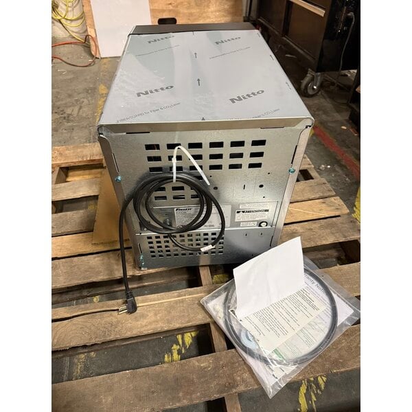 Scratch and Dent Follett 7CI112A-IW-CL-ST-00 Champion 7 Series Air Cooled Chewblet Countertop Ice Maker and Water Dispenser with 7 lb. Bin and Filter - 115V, 100 lb.