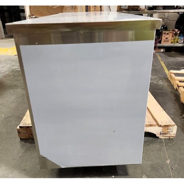 Scratch and Dent Regency 24" x 72" 16 Gauge Type 304 Stainless Steel Enclosed Base Table with Sliding Doors and Adjustable Midshelf