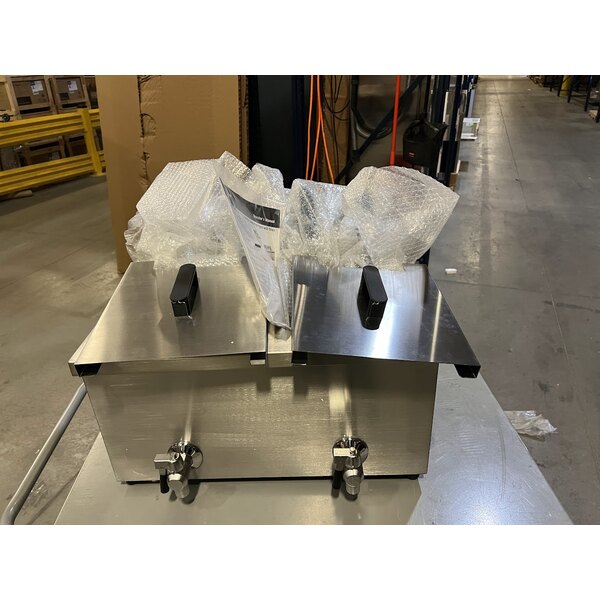 Scratch and Dent Vollrath CF4-3600DUAL-C 30 lb. Medium-Duty Double Well Electric Countertop Fryer with Drain - 208/240V; 5,400-7,200W (Canadian Use Only)