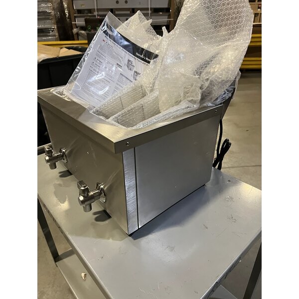 Scratch and Dent Vollrath CF4-3600DUAL-C 30 lb. Medium-Duty Double Well Electric Countertop Fryer with Drain - 208/240V; 5,400-7,200W (Canadian Use Only)