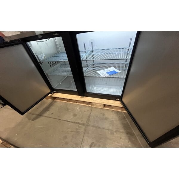 Scratch and Dent Avantco UBB-4-HC 90" Black Counter Height Solid Door Back Bar Refrigerator with LED Lighting