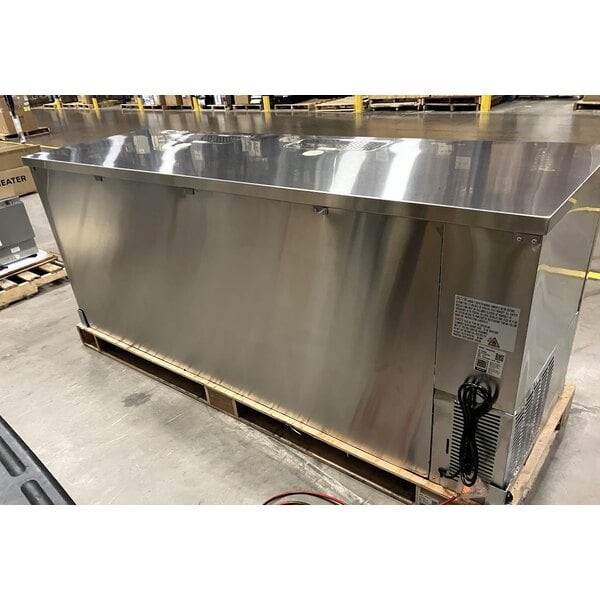 Scratch and Dent Avantco UDD-4-HC-S Stainless Steel Kegerator / Beer Dispenser with (2) 2 Tap Towers - (3) 1/2 Keg Capacity