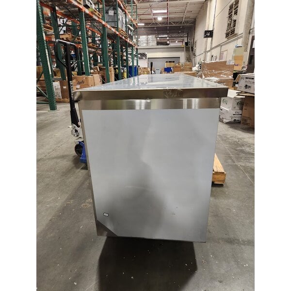 Scratch and Dent Regency 24" x 96" 16 Gauge Type 304 Stainless Steel Enclosed Base Table with Sliding Doors and Adjustable Midshelf