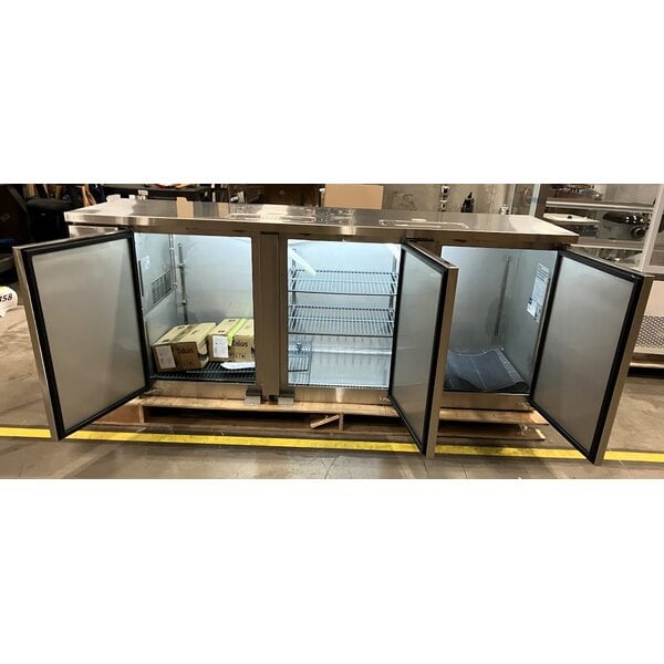 Scratch and Dent Avantco UDD-4-HC-S Stainless Steel Kegerator / Beer Dispenser with (2) 2 Tap Towers - (3) 1/2 Keg Capacity