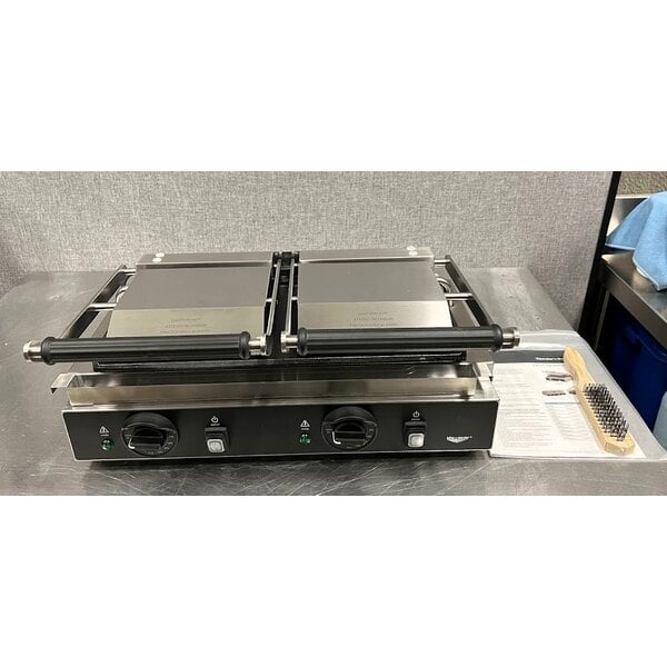 Scratch and Dent Vollrath PSG4-DF208240 Double Cast Iron Panini Grill with Smooth Plates - 19" x 9" Cooking Surface - 208/240V, 2700/3600W