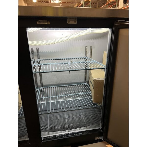 Scratch and Dent Avantco UDD-72-HC (2) Four Tap Shallow Depth Kegerator Beer Dispenser - Black, (3) 1/2 Keg Capacity