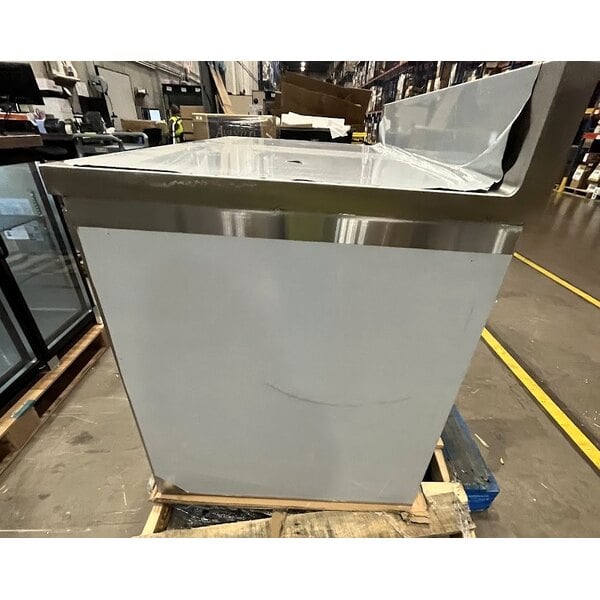 Scratch and Dent Regency 30" x 60" 16 Gauge Type 304 Stainless Steel Enclosed Base Sliding Door Table with Adjustable Midshelf and 6" Backsplash