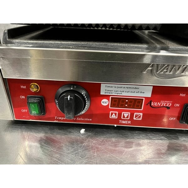 Scratch and Dent Avantco PG400T Commercial Dual Panini Sandwich Grill with Timer, Grooved Plates, and 19 5/8" x 9 1/8" Cooking Surface - 120V, 3500W