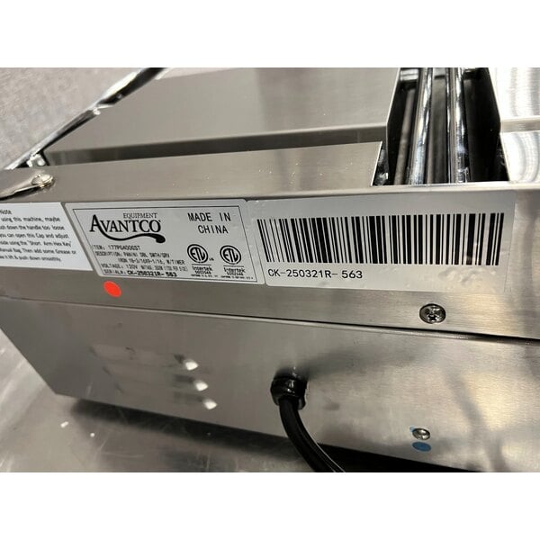 Scratch and Dent Avantco PG400T Commercial Dual Panini Sandwich Grill with Timer, Grooved Plates, and 19 5/8" x 9 1/8" Cooking Surface - 120V, 3500W