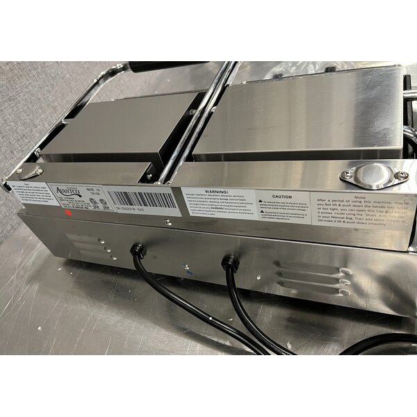 Scratch and Dent Avantco PG400T Commercial Dual Panini Sandwich Grill with Timer, Grooved Plates, and 19 5/8" x 9 1/8" Cooking Surface - 120V, 3500W