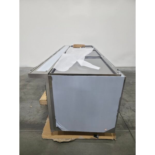 Scratch and Dent Regency 30" x 96" 16 Gauge Type 304 Stainless Steel Enclosed Base Sliding Door Table with Adjustable Midshelf and 6" Backsplash