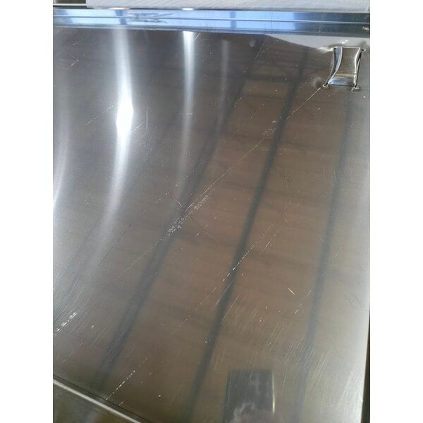 Scratch and Dent Regency 30" x 96" 16 Gauge Type 304 Stainless Steel Enclosed Base Sliding Door Table with Adjustable Midshelf and 6" Backsplash