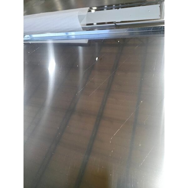 Scratch and Dent Regency 30" x 96" 16 Gauge Type 304 Stainless Steel Enclosed Base Sliding Door Table with Adjustable Midshelf and 6" Backsplash