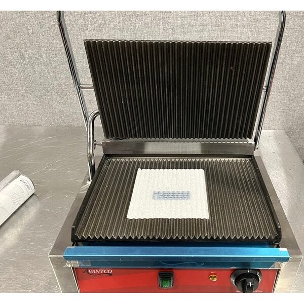 Scratch and Dent Avantco PG200 Commercial Panini Sandwich Grill with Grooved Plates and 13 3/8" x 8 3/4" Cooking Surface - 120V, 1750W