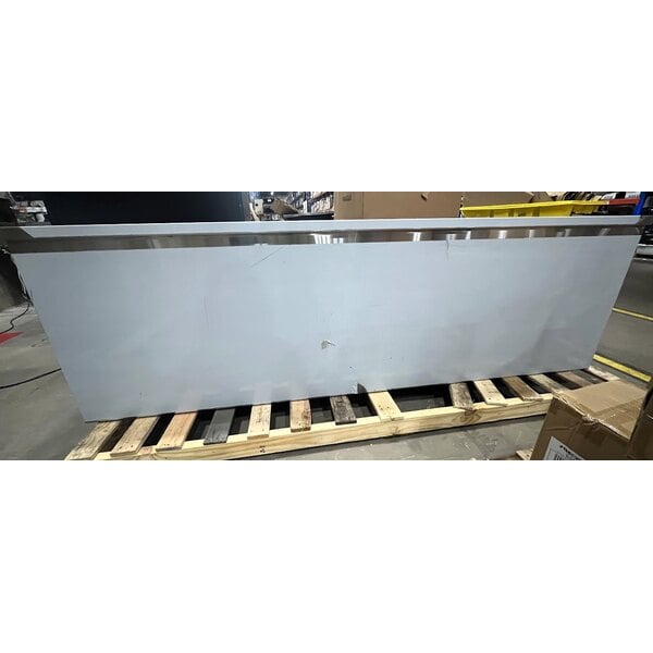 Scratch and Dent Regency 30" x 96" 16 Gauge Type 304 Stainless Steel Enclosed Base Table with Open Front and Adjustable Midshelf