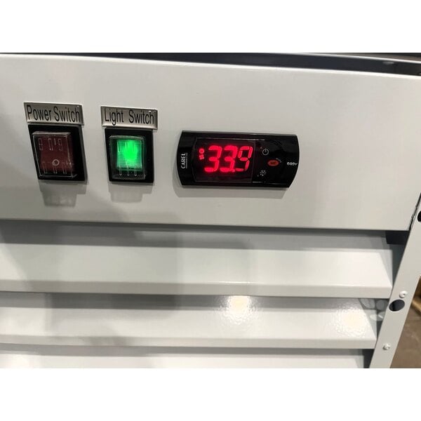 Scratch and Dent Avantco GDC-49-HC 53" White Customizable Swing Glass Door Merchandiser Refrigerator with LED Lighting