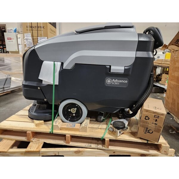 Scratch and Dent Advance SC901 28D 56115535 28" Cordless Walk Behind Floor Scrubber with 242 Ah Wet Batteries, Charger, and Pad Holders - 30 Gallon, 36V, 250 RPM