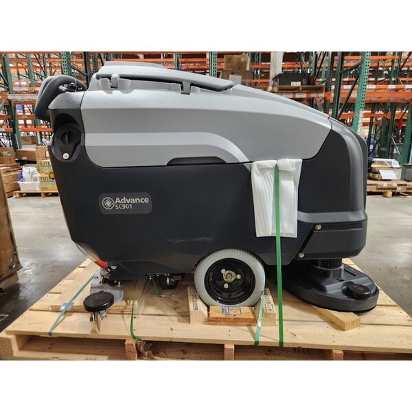 Scratch and Dent Advance SC901 28D 56115535 28" Cordless Walk Behind Floor Scrubber with 242 Ah Wet Batteries, Charger, and Pad Holders - 30 Gallon, 36V, 250 RPM