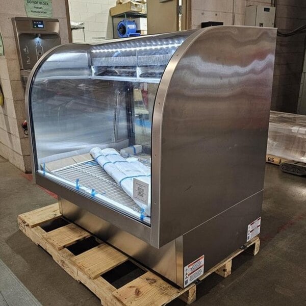 Scratch and Dent True TCGG-48-S-HC-LD 48 1/4" Stainless Steel Curved Glass Refrigerated Deli Case