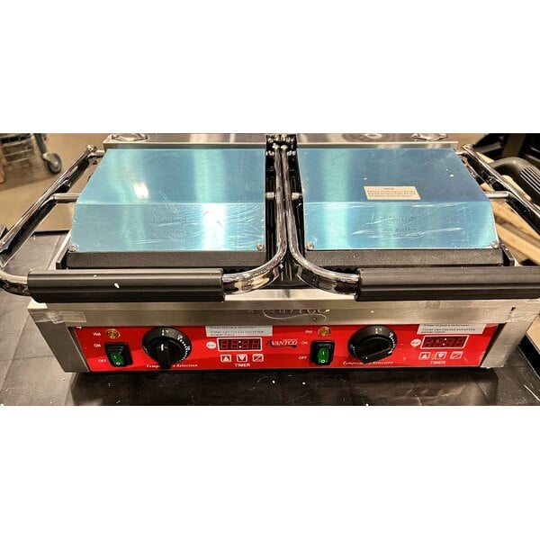 Scratch and Dent Avantco PG400T Commercial Dual Panini Sandwich Grill with Timer, Grooved Plates, and 19 5/8" x 9 1/8" Cooking Surface - 120V, 3500W