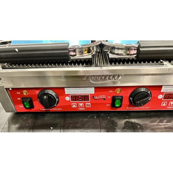 Scratch and Dent Avantco PG400T Commercial Dual Panini Sandwich Grill with Timer, Grooved Plates, and 19 5/8" x 9 1/8" Cooking Surface - 120V, 3500W