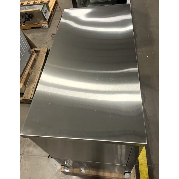 Scratch and Dent Avantco UBB-48S-HC 48" Stainless Steel Counter Height Narrow Sliding Glass Door Back Bar Refrigerator with LED Lighting