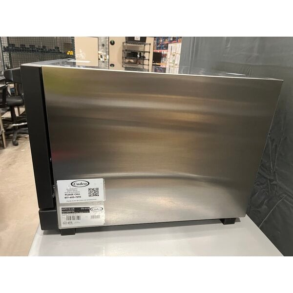 Scratch and Dent Cadco Lisa OV-013 3-Shelf Half Size Medium-Duty Manual Countertop Convection Oven - 120V