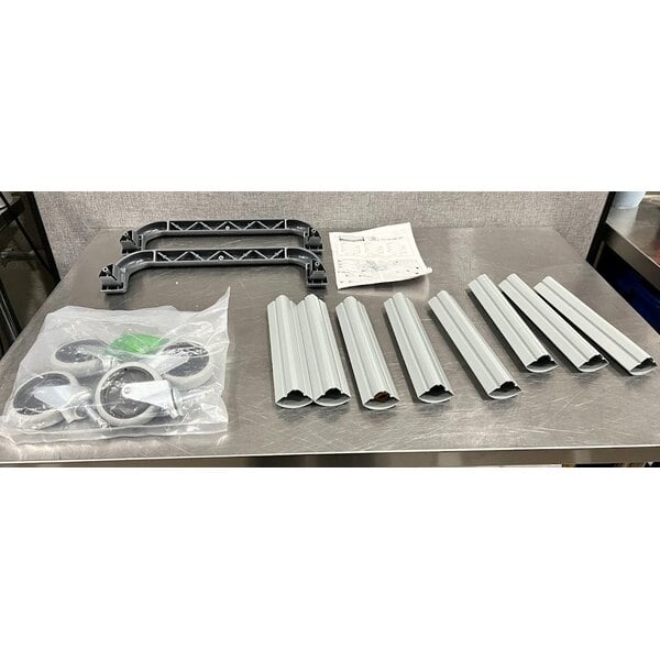 Scratch and Dent Rubbermaid® FG409100GRAY Xtra Gray 300 lb. Three Shelf Utility Cart / Bus Cart 40" x 20" x 37"