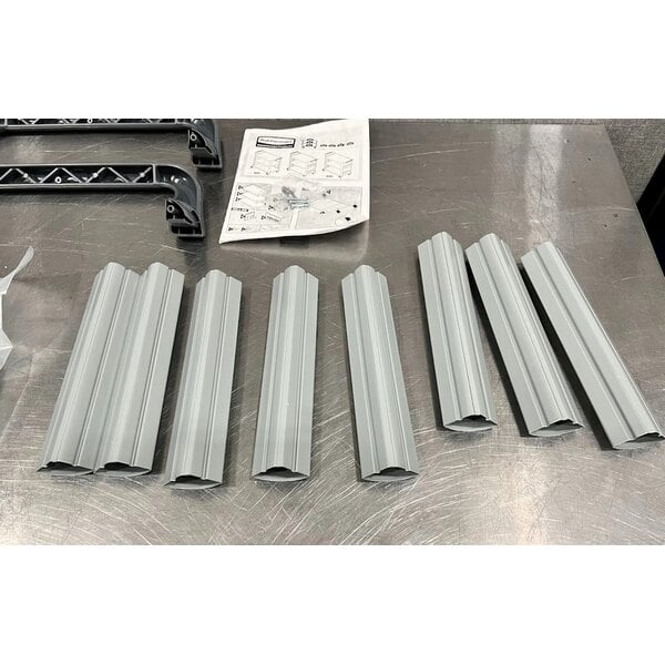 Scratch and Dent Rubbermaid® FG409100GRAY Xtra Gray 300 lb. Three Shelf Utility Cart / Bus Cart 40" x 20" x 37"