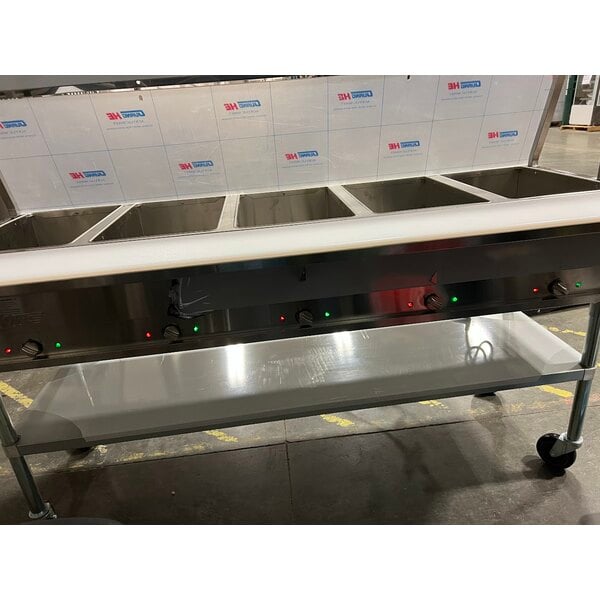 Scratch and Dent ServIt Five Pan Open Well Electric Steam Table with Angled Sneeze Guard, Tubular Tray Slide, and Casters - 208/240V, 3750W