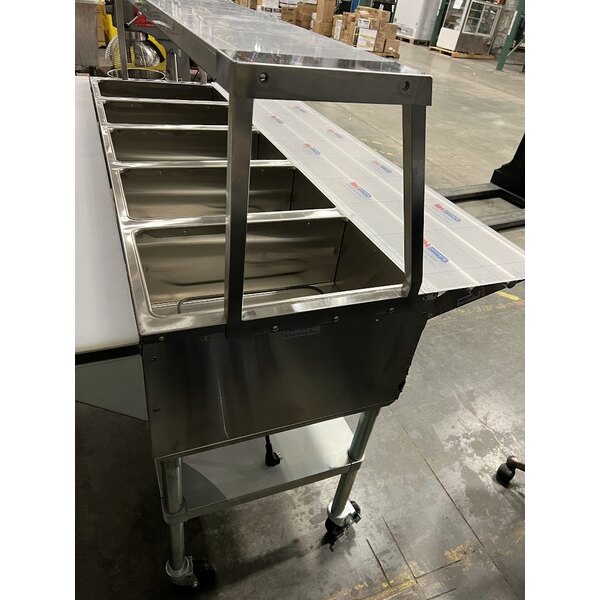 Scratch and Dent ServIt Five Pan Open Well Electric Steam Table with Angled Sneeze Guard, Tubular Tray Slide, and Casters - 208/240V, 3750W