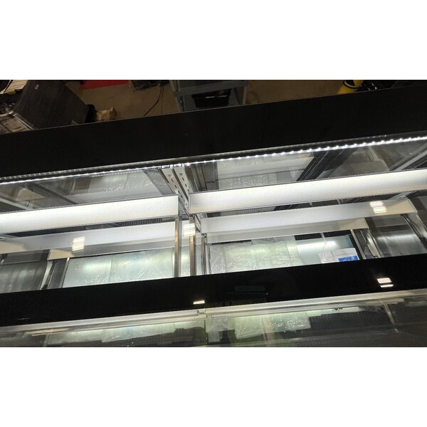 Scratch and Dent Avantco BCTD-72 72" Black 3-Shelf Curved Glass Dry Bakery Display Case with LED Lighting