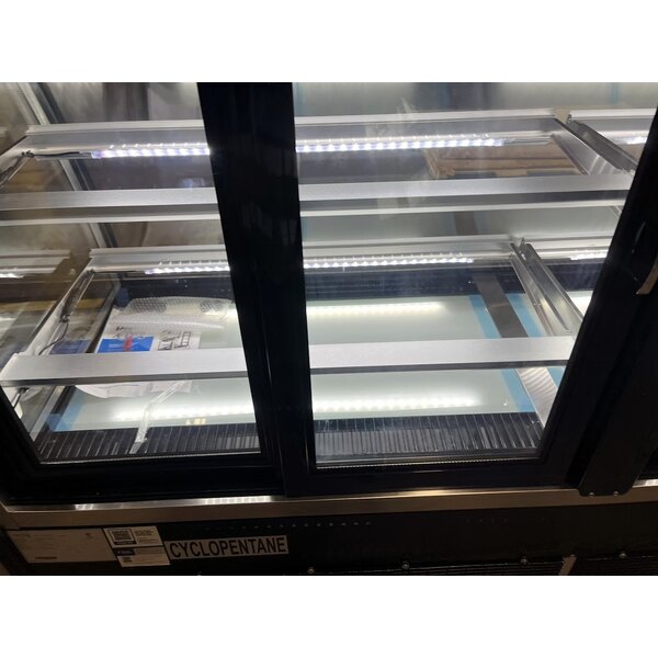 Scratch and Dent Avantco BCTD-72 72" Black 3-Shelf Curved Glass Dry Bakery Display Case with LED Lighting