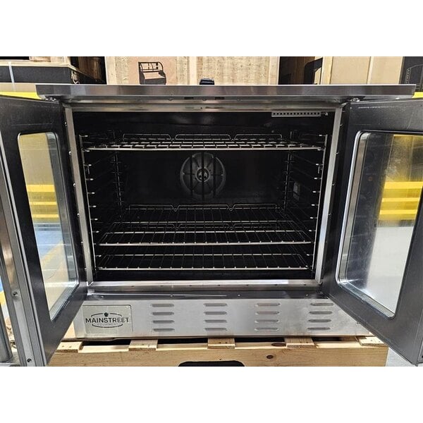 Scratch and Dent MainStreet Equipment CG1-N Single Deck Full Size Natural Gas Convection Oven with Legs - 54,000 BTU
