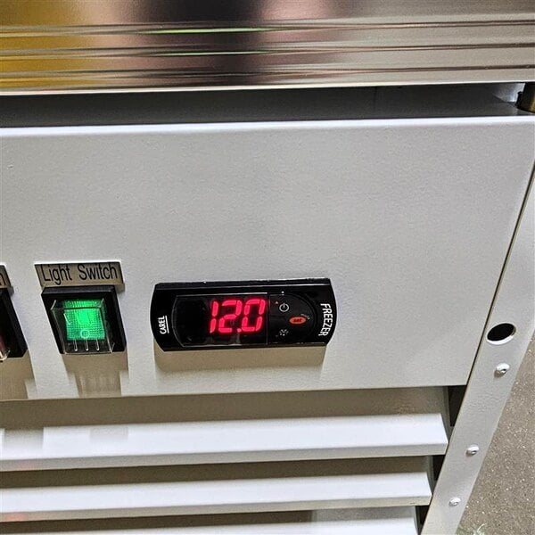 Scratch and Dent Avantco GDC-24F-HC 31" White Customizable Swing Glass Door Merchandiser Freezer with LED Lighting