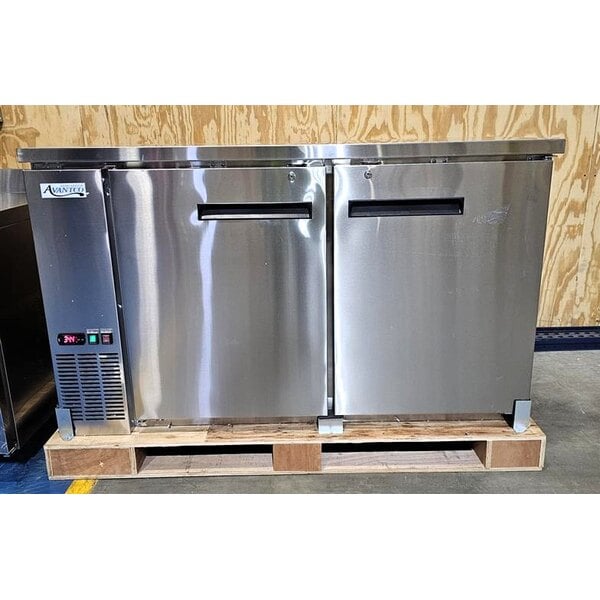 Scratch and Dent Avantco UBB-60-HC-S 60" Stainless Steel Counter Height Narrow Solid Door Back Bar Refrigerator with LED Lighting
