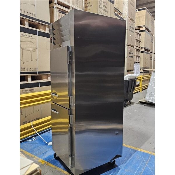 Scratch and Dent Traulsen G10003P 1 Section Solid Half Door Pass-Through Refrigerator - Right / Left Hinged Doors