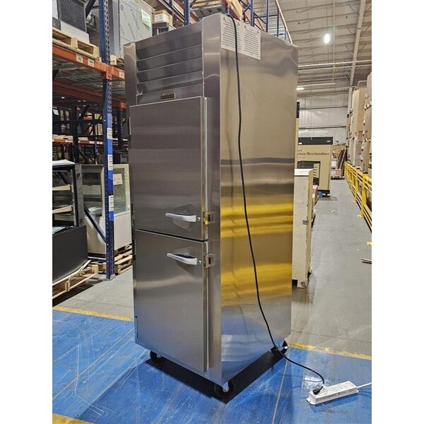 Scratch and Dent Traulsen G10003P 1 Section Solid Half Door Pass-Through Refrigerator - Right / Left Hinged Doors