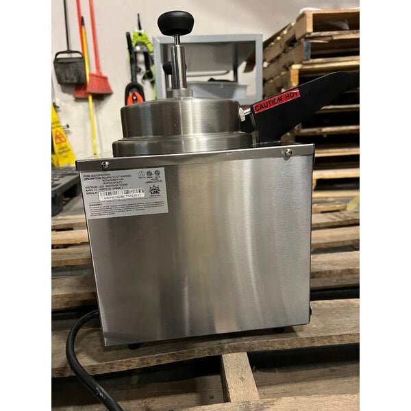 Scratch and Dent Carnival King HSPW35DBL Double 3.5 Qt. Warmer with Heated Spouts and Pumps - 120V, 1100W