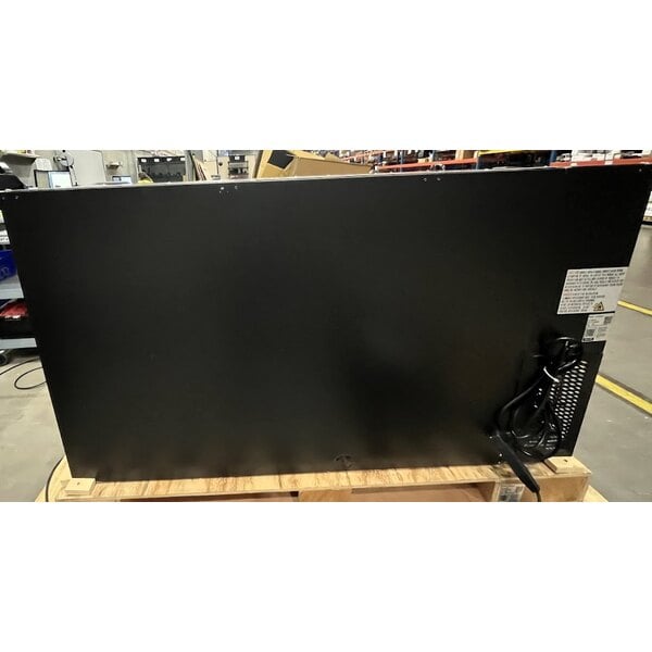 Scratch and Dent Avantco UBB-60-GT 60" Black Underbar Height Narrow Solid Door Back Bar Refrigerator with Galvanized Top and LED Lighting