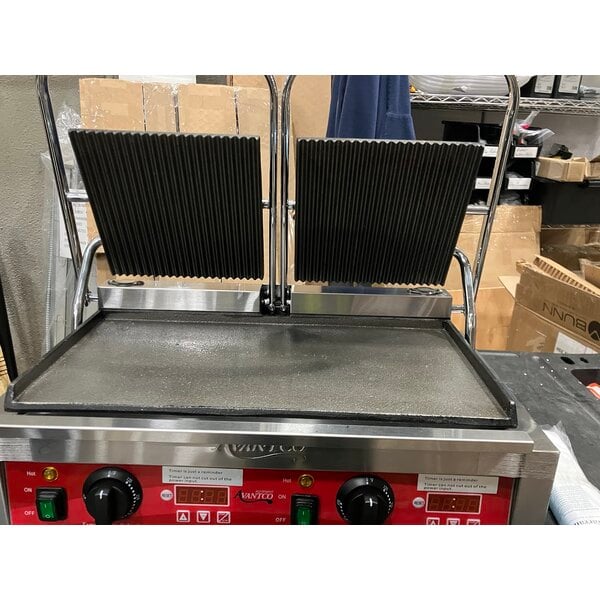 Scratch and Dent Avantco PG400GST Commercial Dual Panini Sandwich Grill with Timer, Grooved Top and Smooth Bottom Plates, and 19 5/8" x 9 1/8" Cooking Surface - 120V, 3500W