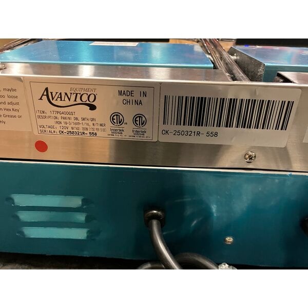 Scratch and Dent Avantco PG400GST Commercial Dual Panini Sandwich Grill with Timer, Grooved Top and Smooth Bottom Plates, and 19 5/8" x 9 1/8" Cooking Surface - 120V, 3500W